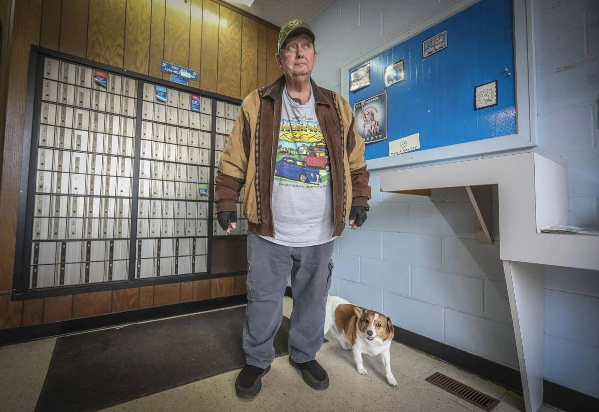 Man standing with a dog